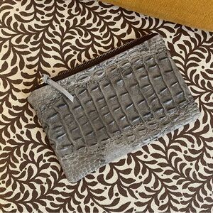 Crocodile Embossed Leather Utility Clutches. Black, brown, and gray.